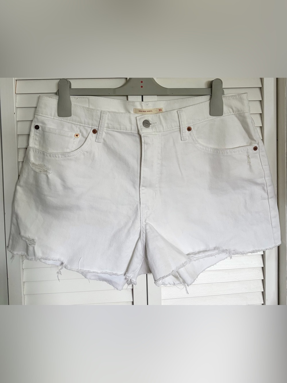 Levi’s White Distressed High Waisted Denim Shorts